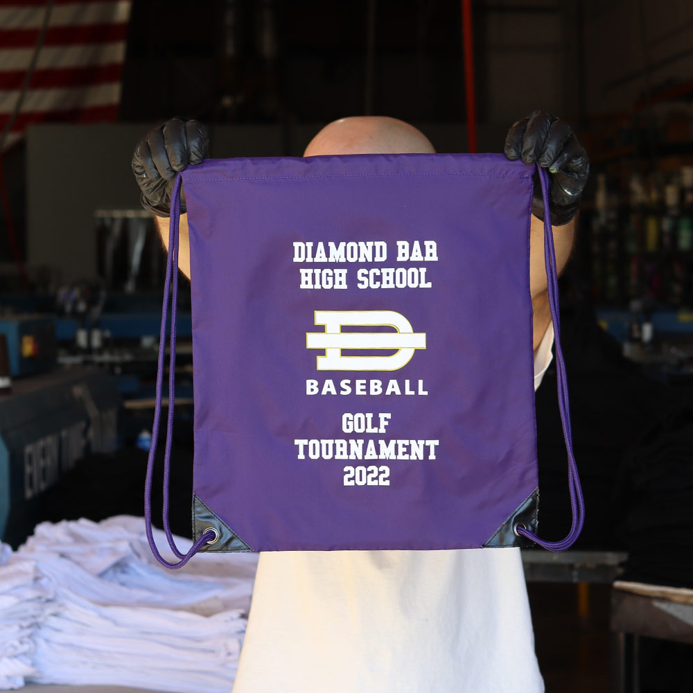 This is a photo of a custom screen printed cinch bag for Diamond Bar High School.