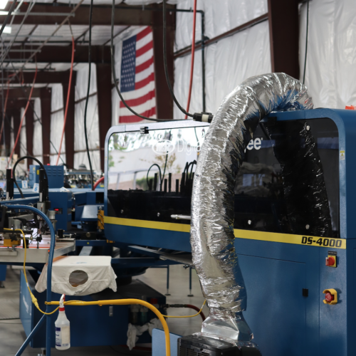 This is a photo of the digital squeegee machine inside Garment Decor's factory.