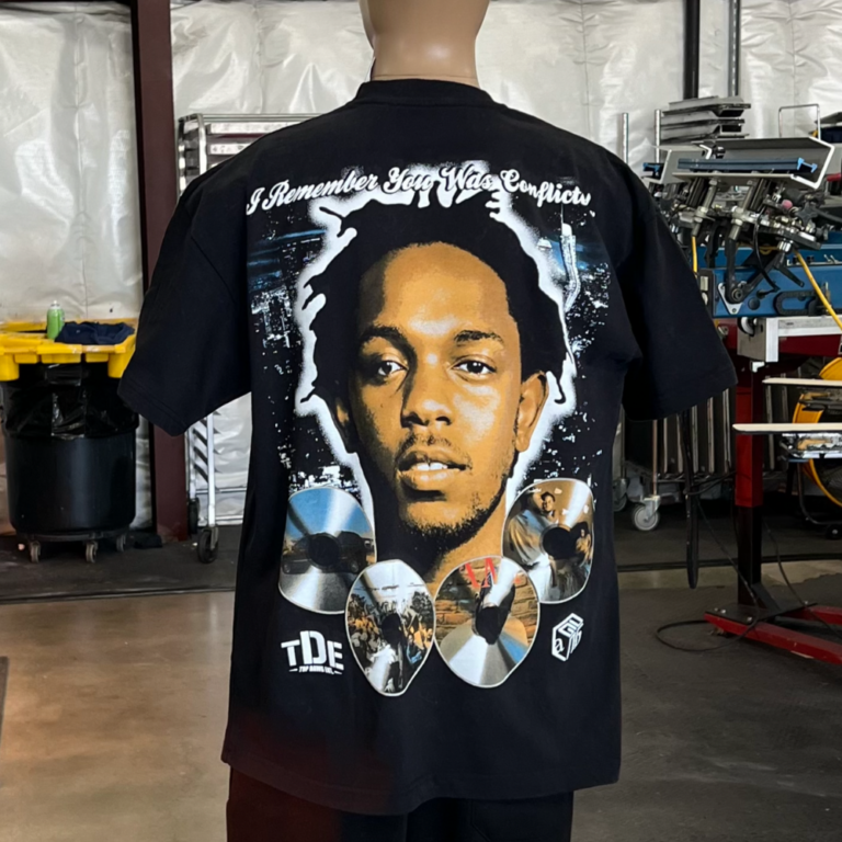 This is a black Los Angeles Apparel 1801GD t-shirt with a jumbo screen printed 8 color design on the front on a mannequin.