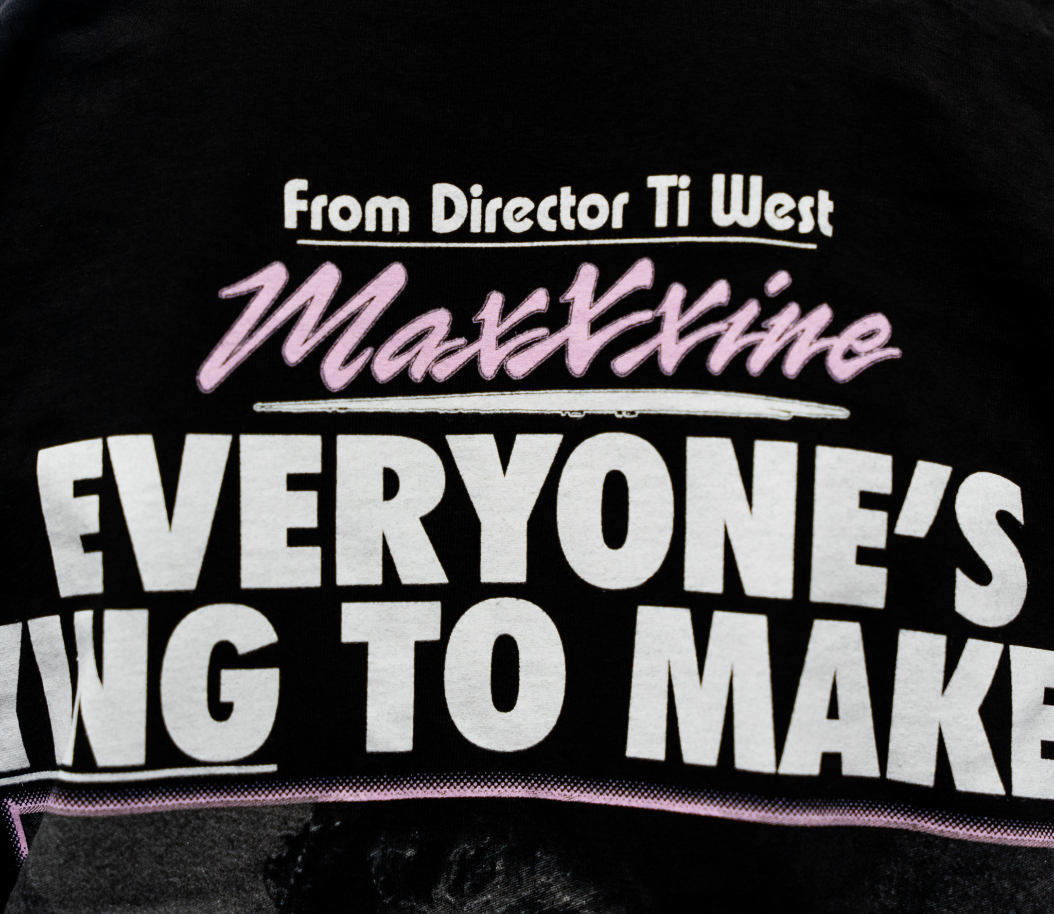 MaxXine movie-themed T-shirt with a bold 'Everyone's Dying to Make It in Hollywood' screen print.