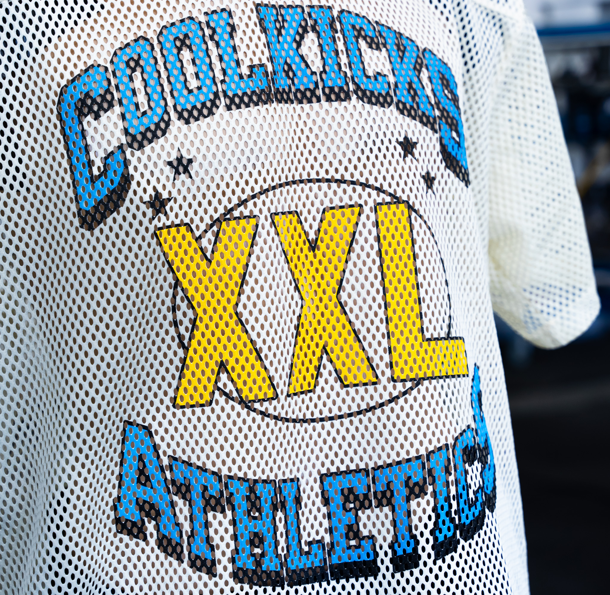 Custom white A4 N4190 Football Jerseys for Cool Kicks Clothing featuring a three color custom screen print.