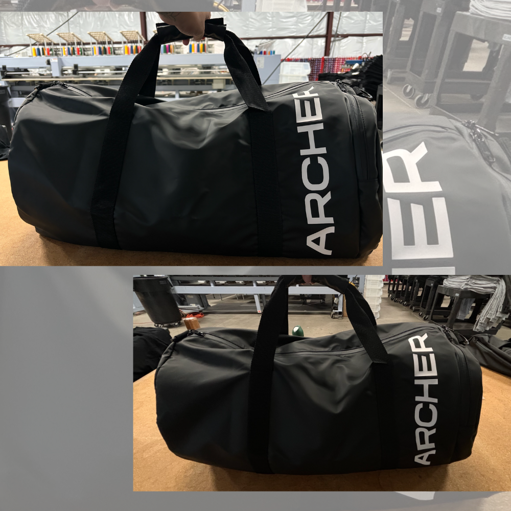 Black Archer bag with bold silicone transfer logo displayed vertically.