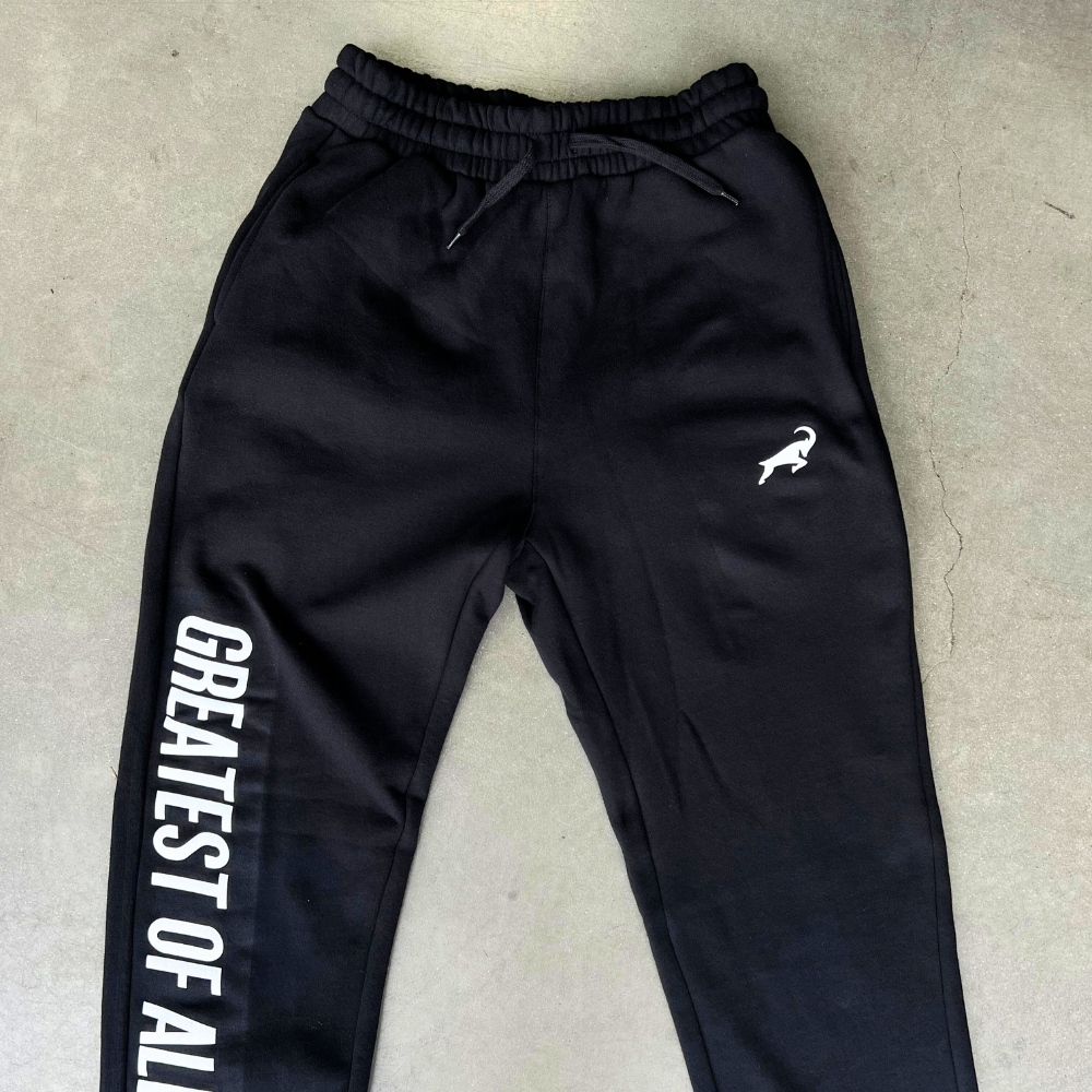 Custom screen printed AS Colour 5921 Stencil Track pants in black for Goat Fuel. We screen printed their tag line on the right hand jogger side and then printed their logo on the left pocket in white.