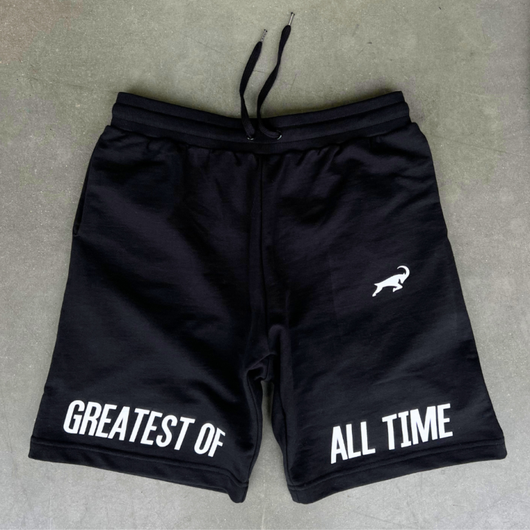 AS Colour style 5916 "Stadium Shorts" in black for Goat Fuel. Their tag line is screen printed in white on the bottom of each short and their logo is screen printed on the left hand pocket.