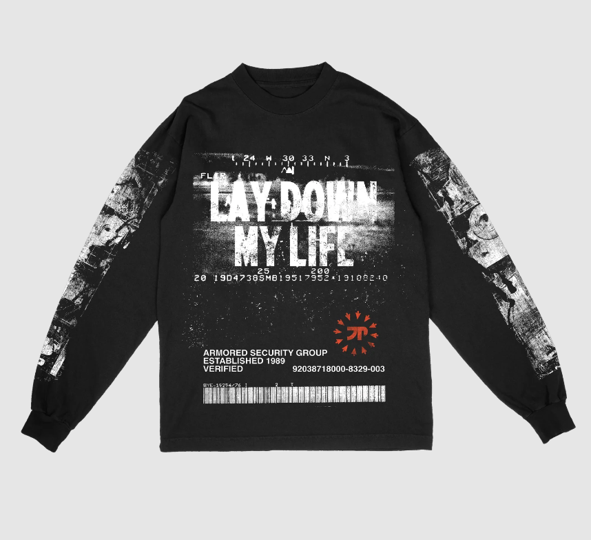 Black long-sleeve t-shirt with bold jumbo screen print reading 'Lay Down My Life' and grunge-style graphics.