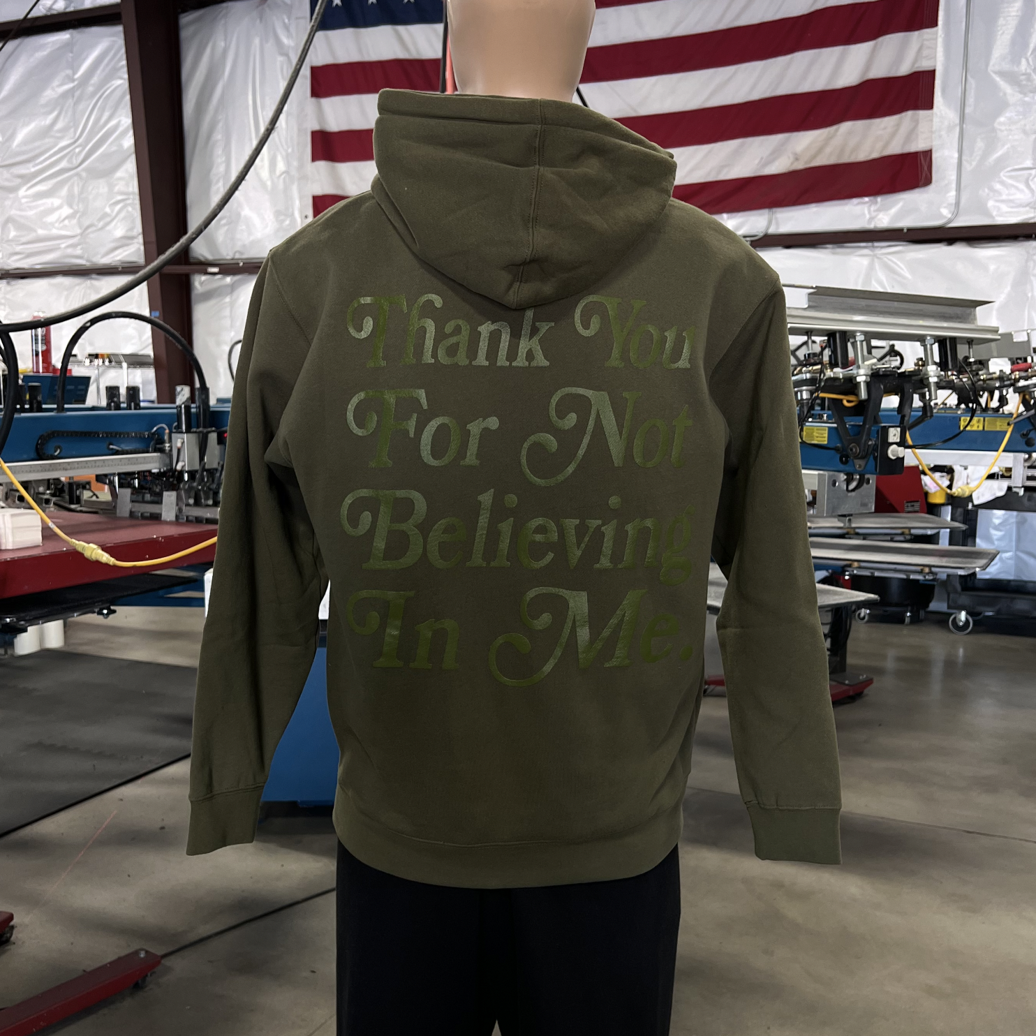 Custom tonal screen printing green ink on olive hoodie