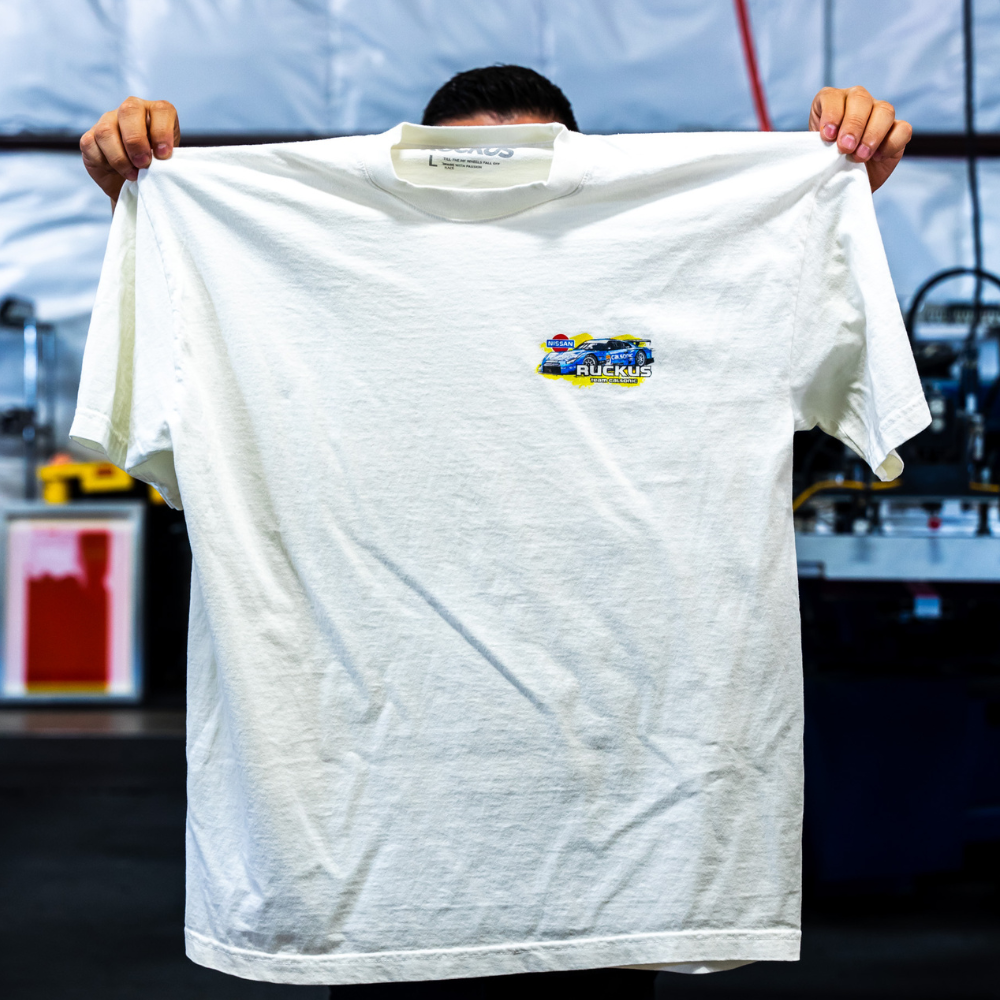 Front view of an 1801GD LA Apparel Tee showcasing vibrant digital squeegee printing on the left chest area.