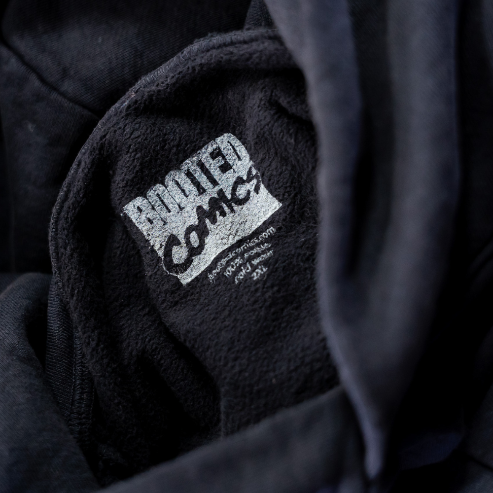 Close-up of the neck label on a Los Angeles Apparel HF09 Heavy Fleece Hoodie with custom branding.