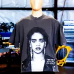 The mannequin wearing and showing the front view of a dark grey Shaka Wear 7.5oz Max Heavyweight tee with custom jumbo print design by Garment Decor